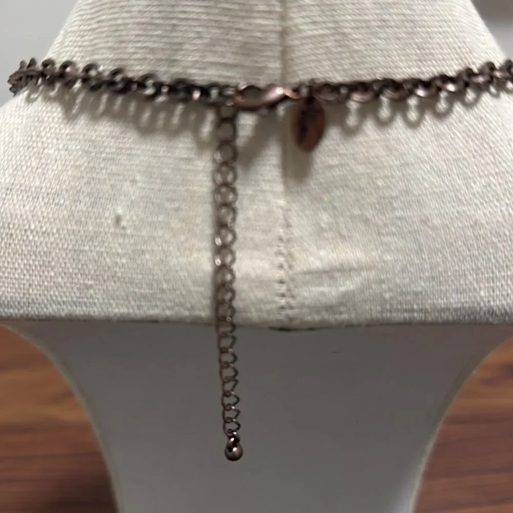 Lia Sophia Signed Bronze necklace with Abalone, Fresh Water Pearls and Charms.